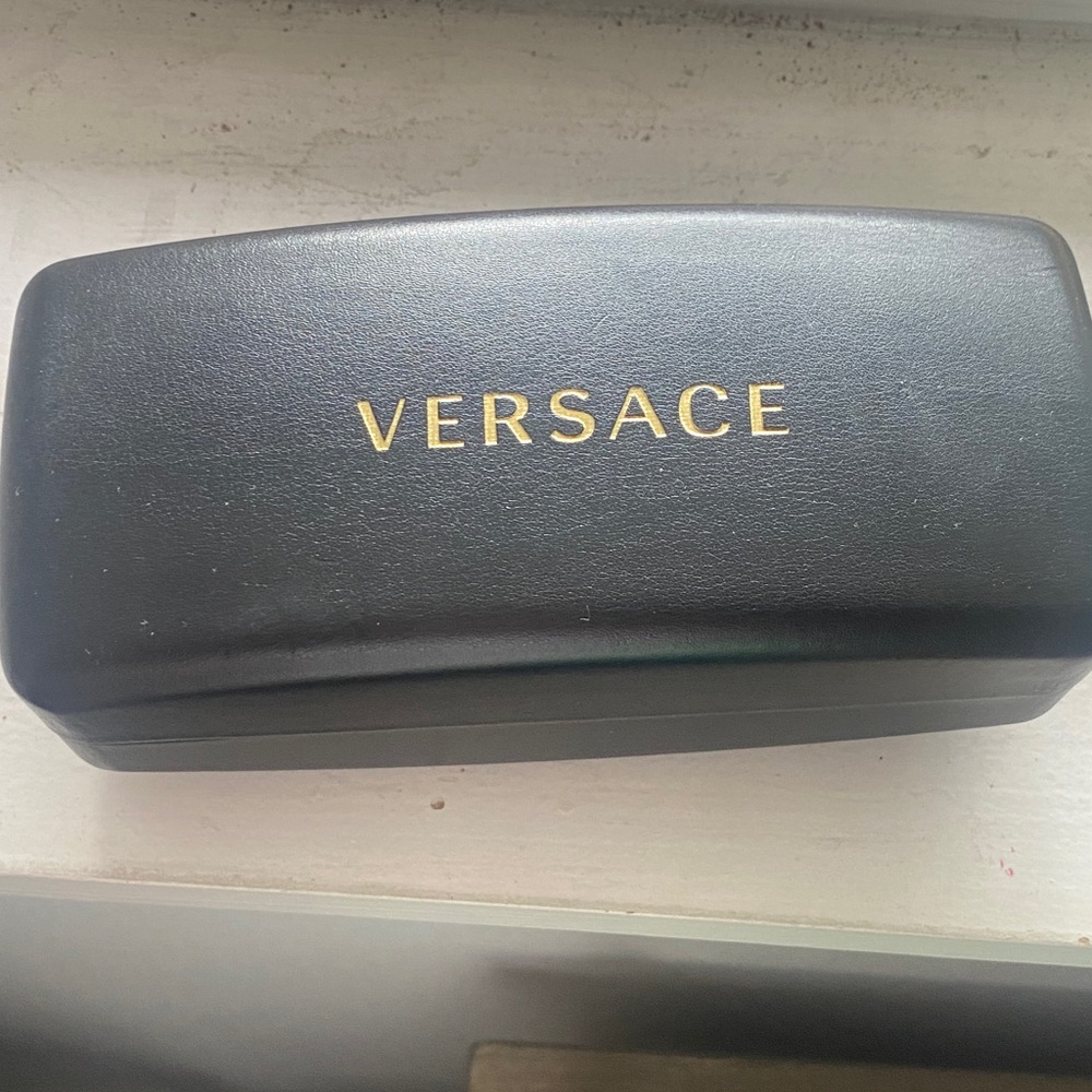 Versace Black Case with Gold Lettering